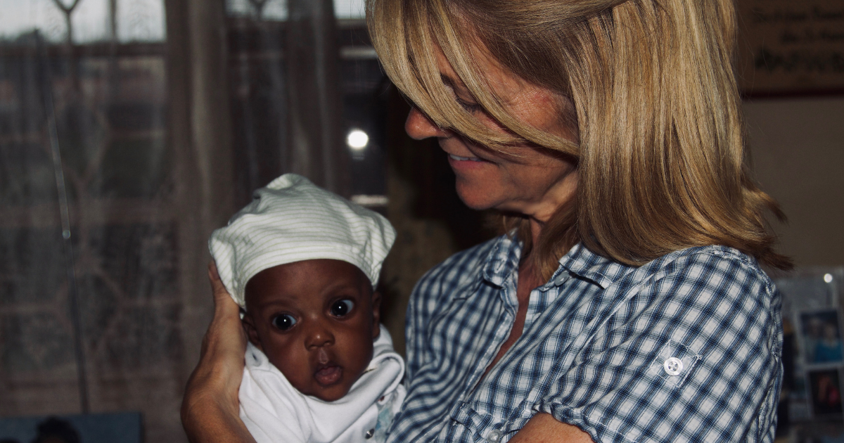 Photo of Janet with baby Solomon